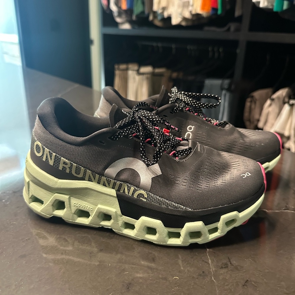 On Running Black and Mint Athletic Shoes